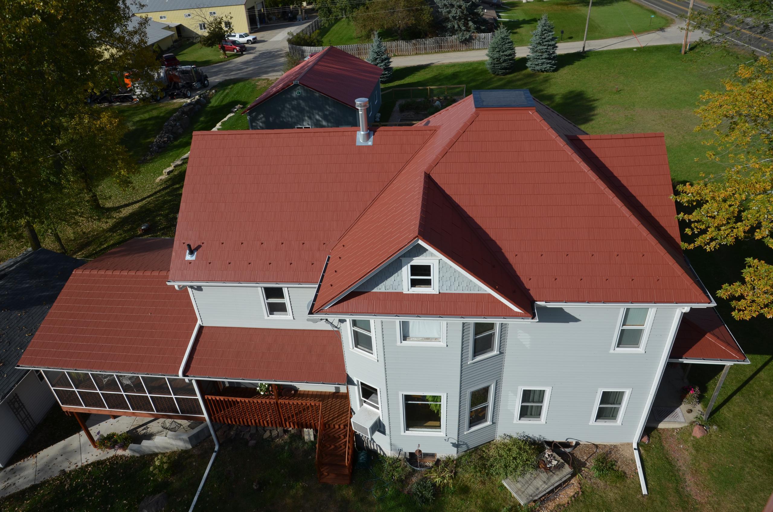 Arrowline Shake Classic Red Roofing from EDCO was installed on this home in Wisconsin because of the natural look and architectural detail of hand-split shakes.