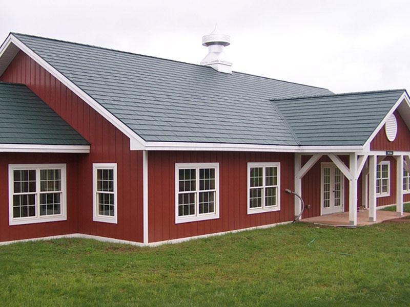 EDCO's classic steel siding giving a red board and batten look.