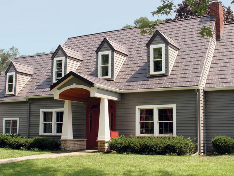 The homeowners of a cottage style home in Wisconsin chose EDCO's Arrowline Shake Statuary Bronze Roofing because it provided them with peace of mind, knowing that their home will retain the natural look of the home which is backed by an unmatched industry warranty.