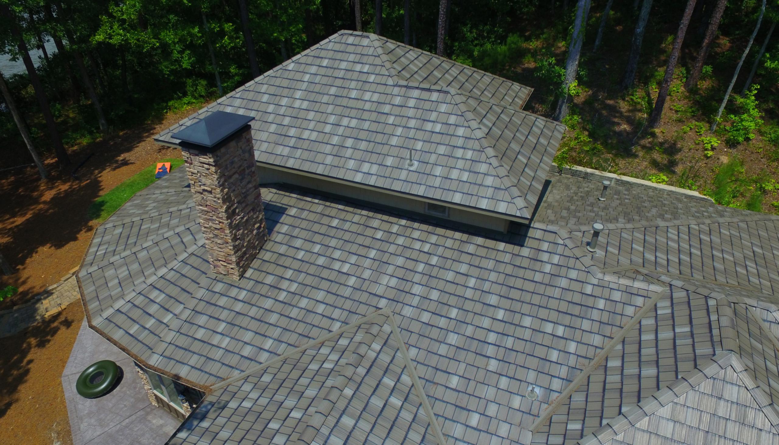 Arrowline Enhanced Shake T-Tone Blend Roofing was selected for this home in a rural wooded area in Alabama to give the roof a weathered look to compliment the environment surrounding the home.