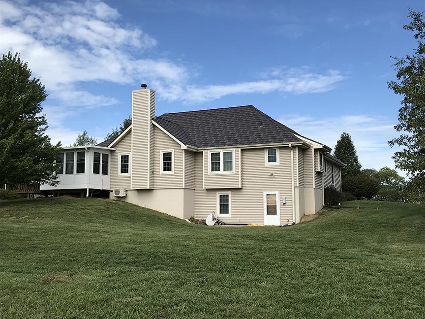The homeowners of this rural home chose EDCO's award-winning Infiniti Roofing in Aged Bronze Enhanced because of its durability and sustainability.