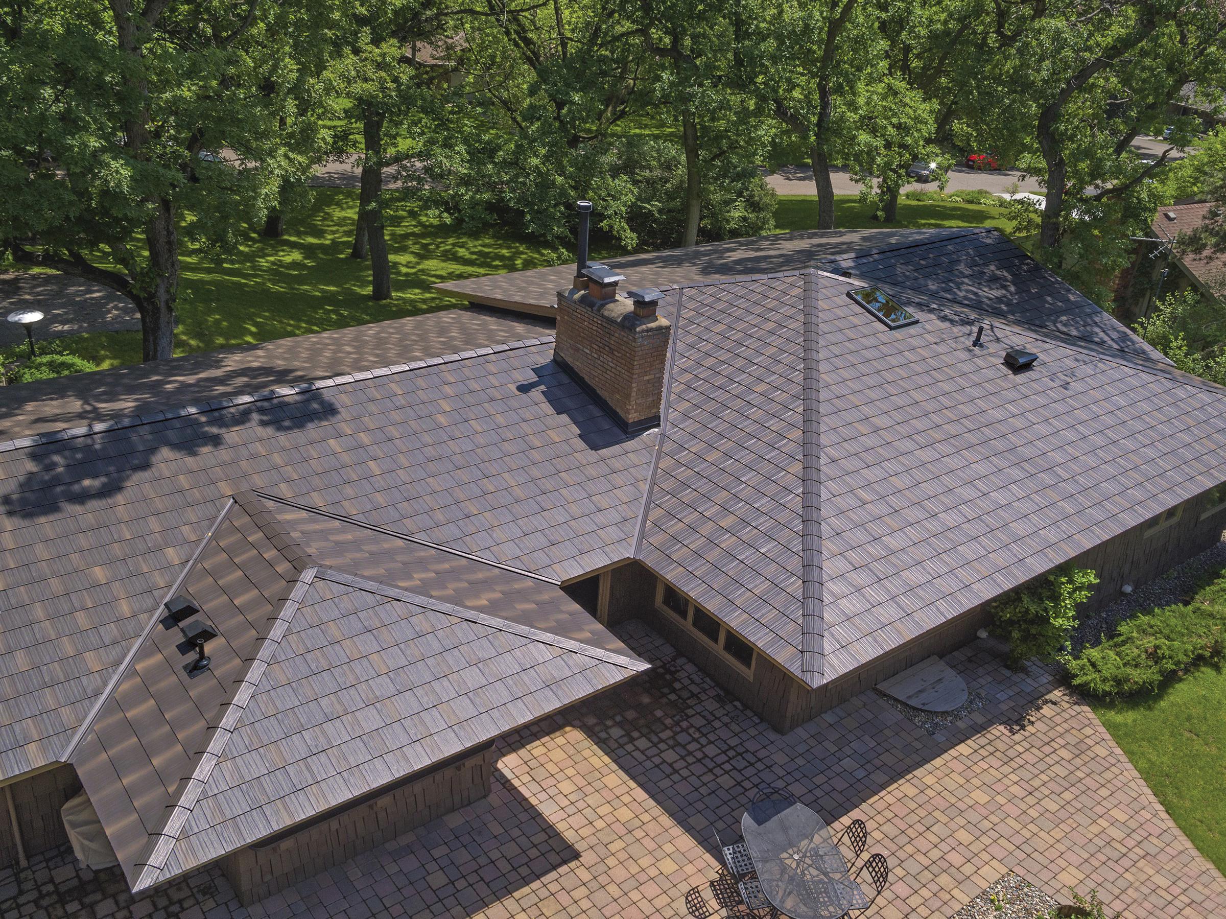 The award-winning Infiniti Textured Shake, the most technolgically advanced roofing panel in the industry, was selected to replace an existing roof because of its unmatched durability and performance