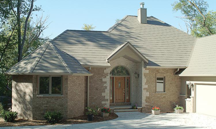 A new home in Wisconsin had EDCO's steel roofing in T-Tone color installed to complement the beauty of the two-tone brick color on the exterior of the home.