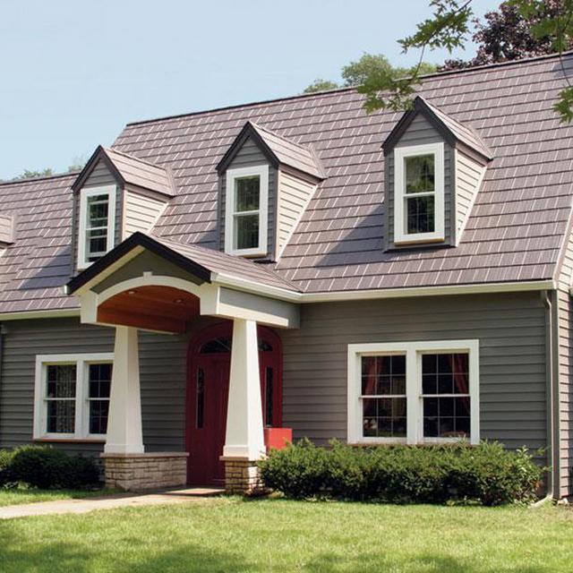 The homeowners of a cottage style home in Wisconsin chose EDCO's Arrowline Shake Statuary Bronze Roofing because it provided them with peace of mind, knowing that their home will retain the natural look of the home which is backed by an unmatched industry warranty.