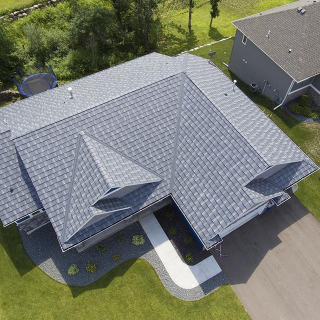 The beautiful Infiniti Textured Shake roofing in Granite Gray Enhanced added character to this neighborhood.