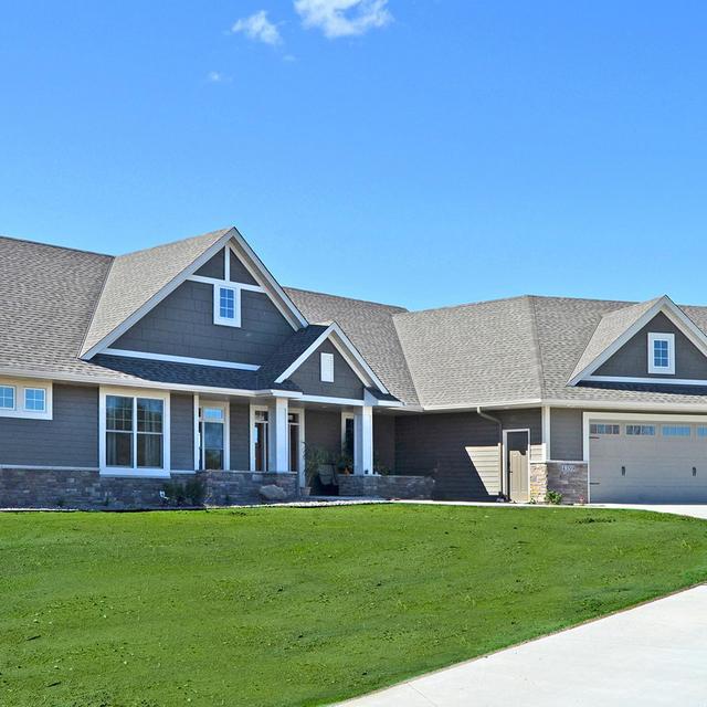 Charm and everlasting beauty are found on this home after the installation of EDCO's steel Single 6" Traditional Lap Siding in T-Tone.