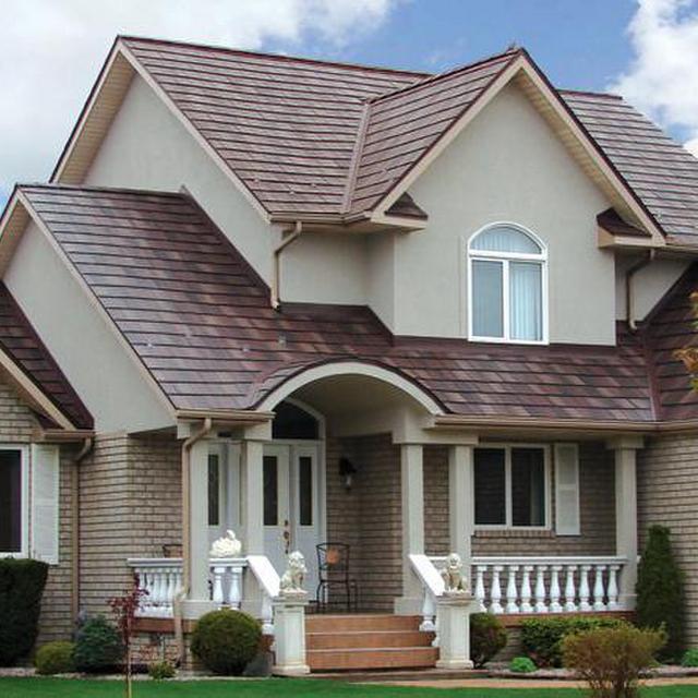The natural look of the Arrowline Shake Roofing in Royal Brown Blend was selected to blend in with the exterior brick color of the home.