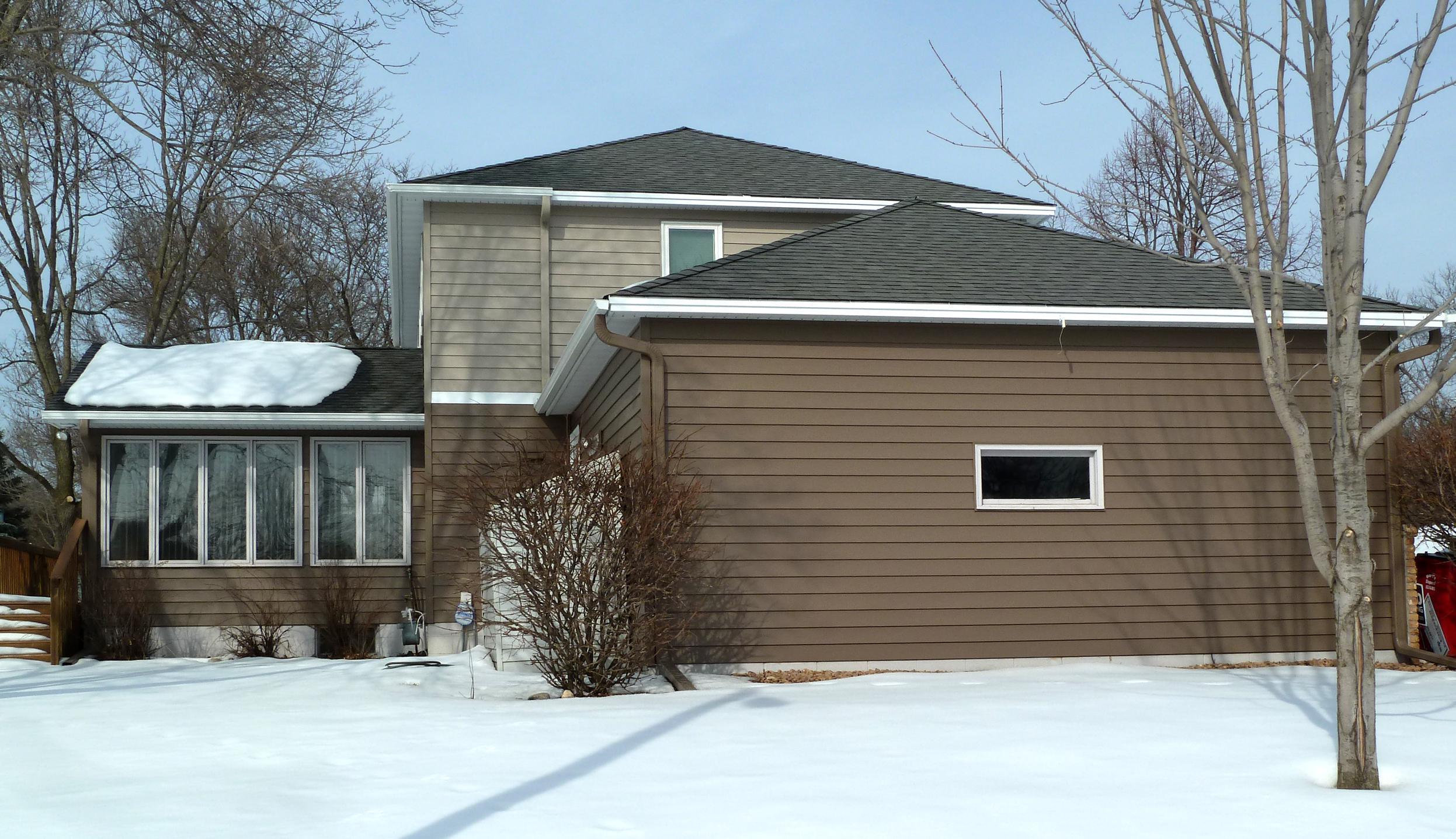 The Sandtone Timber Siding on this Minnesota home gave it unique charm and the natural look desired by the homeowner.