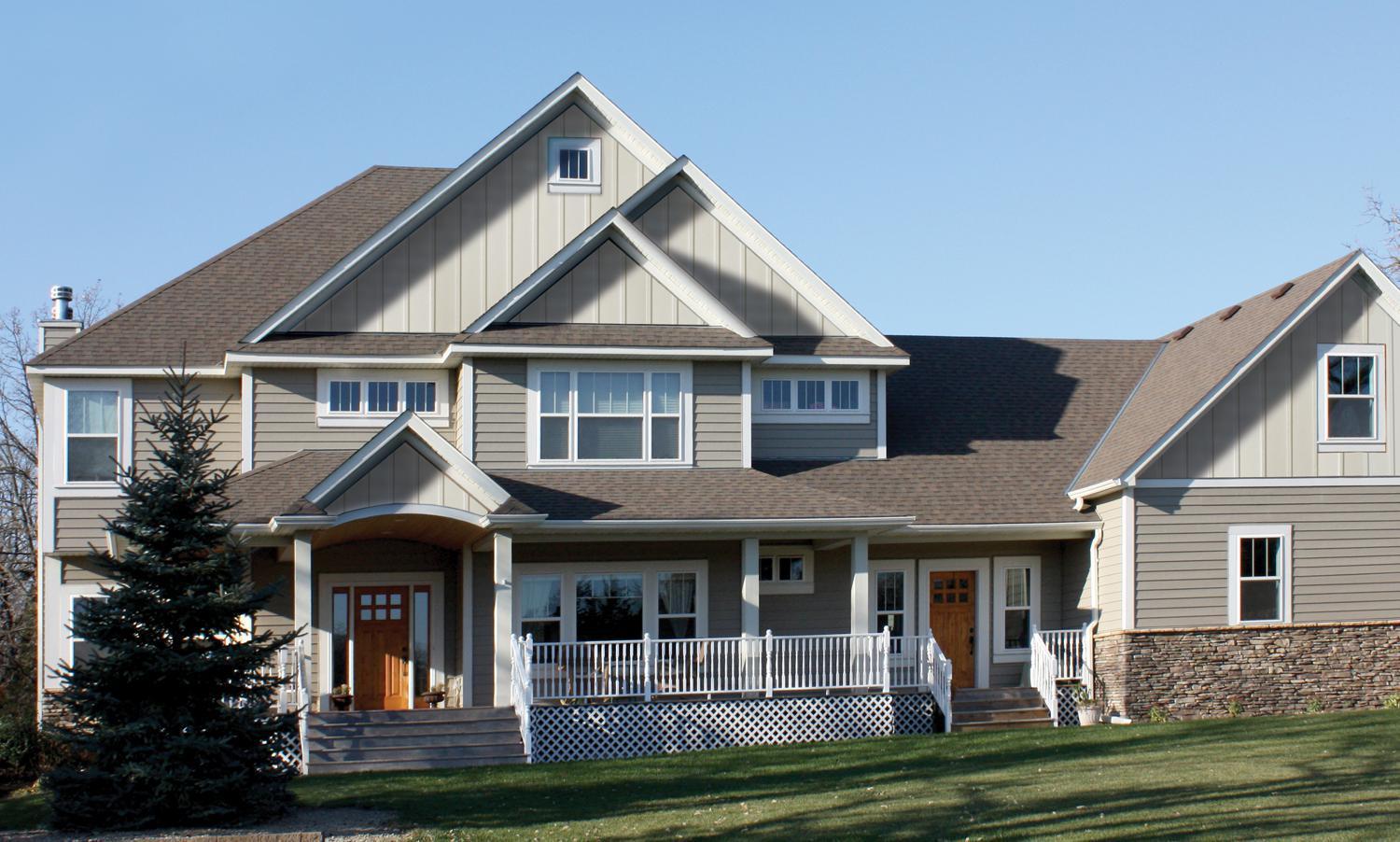 Vertical 12" Board and Batten in Desert Tone, in addition to the Single 6" Traditional Lap Siding in wickertone, not only gives this home a natural look but gives a distinctive accent in the gables for a stunning appearance