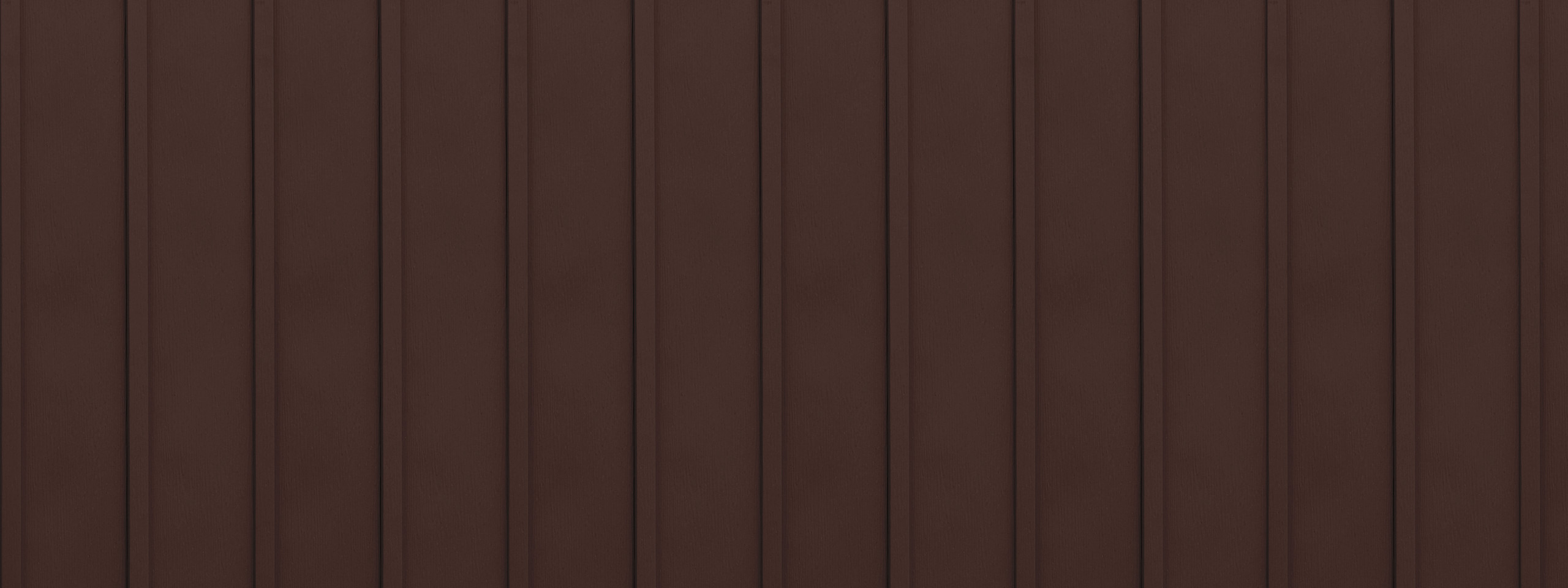 Entex vertical rustic brown board and batten steel siding